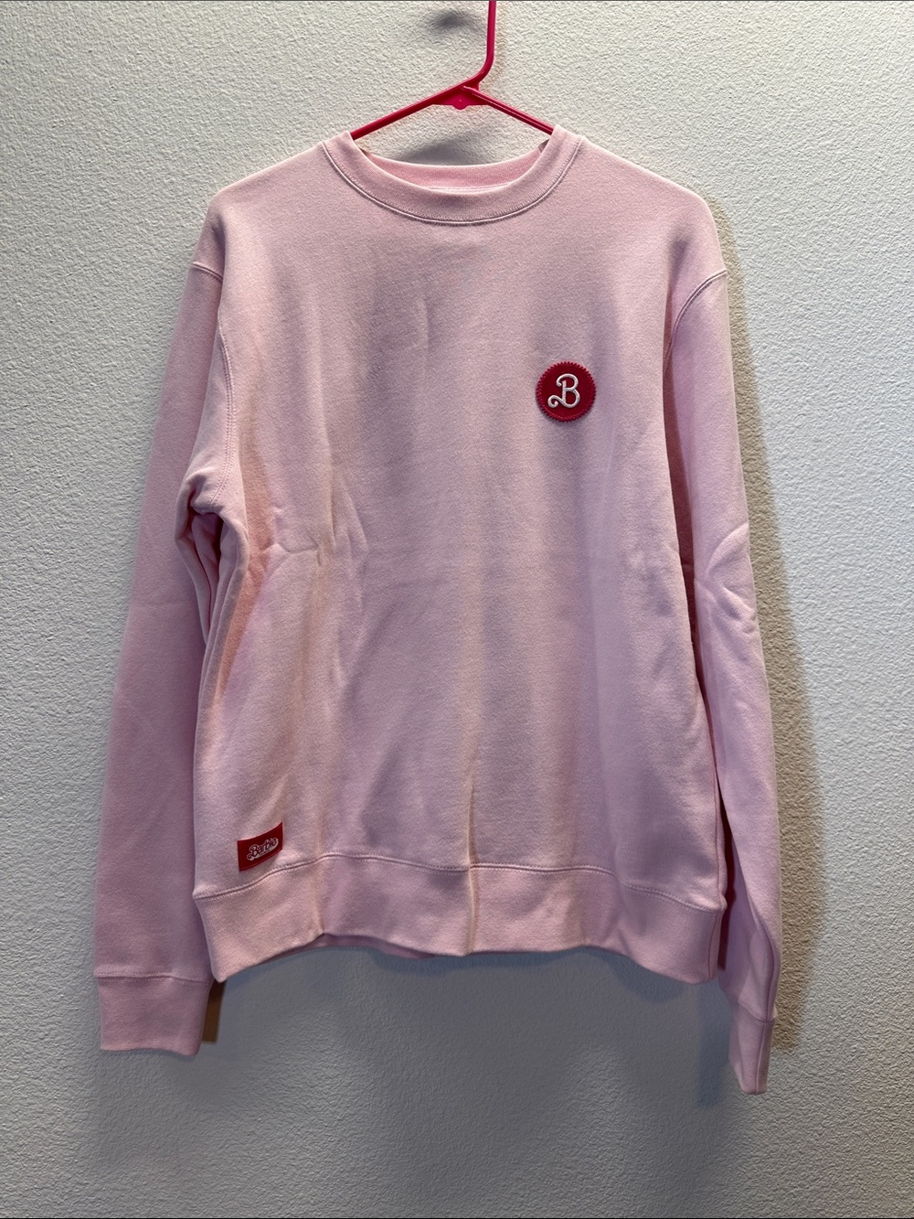 Barbie the Movie Women's Pink Crewneck Sweater Patch Logo Women’s Size Small